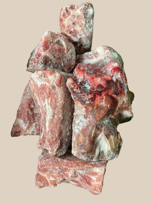 Lamb Neck Bones.  Raw, Frozen.
